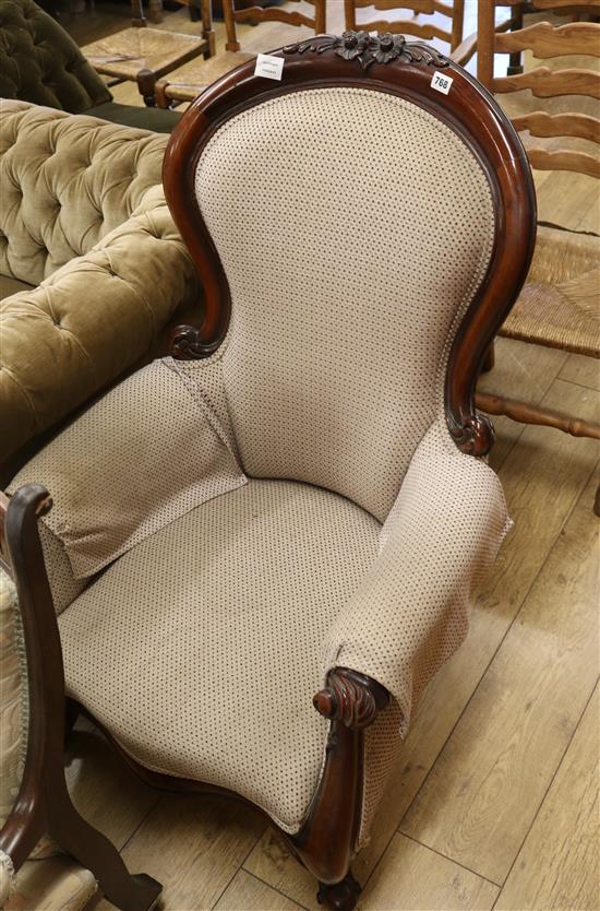 A Victorian style mahogany armchair